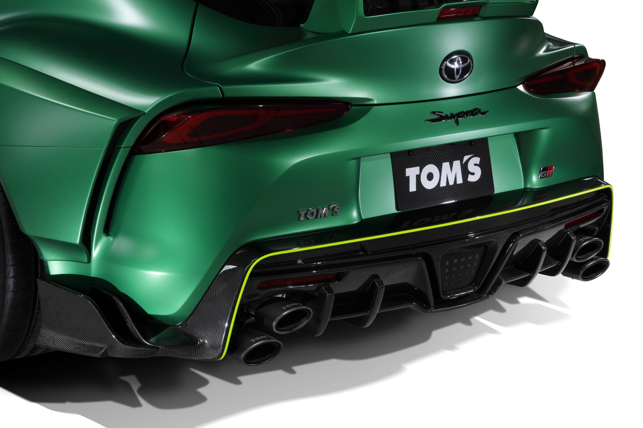 TOM'S Racing - 2020+ Toyota GR Supra Rear Bundle Kit - Barrel Muffler + Fully Dry Carbon Rear Bumper Diffuser