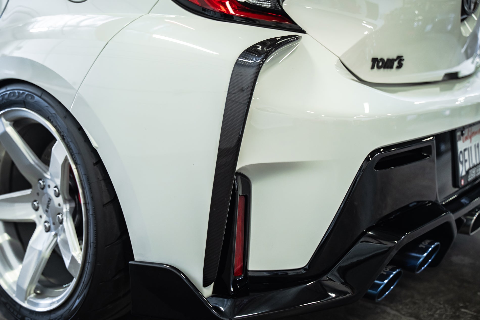 TOM'S Racing - Carbon Fiber Rear Bumper Garnish - Toyota GR