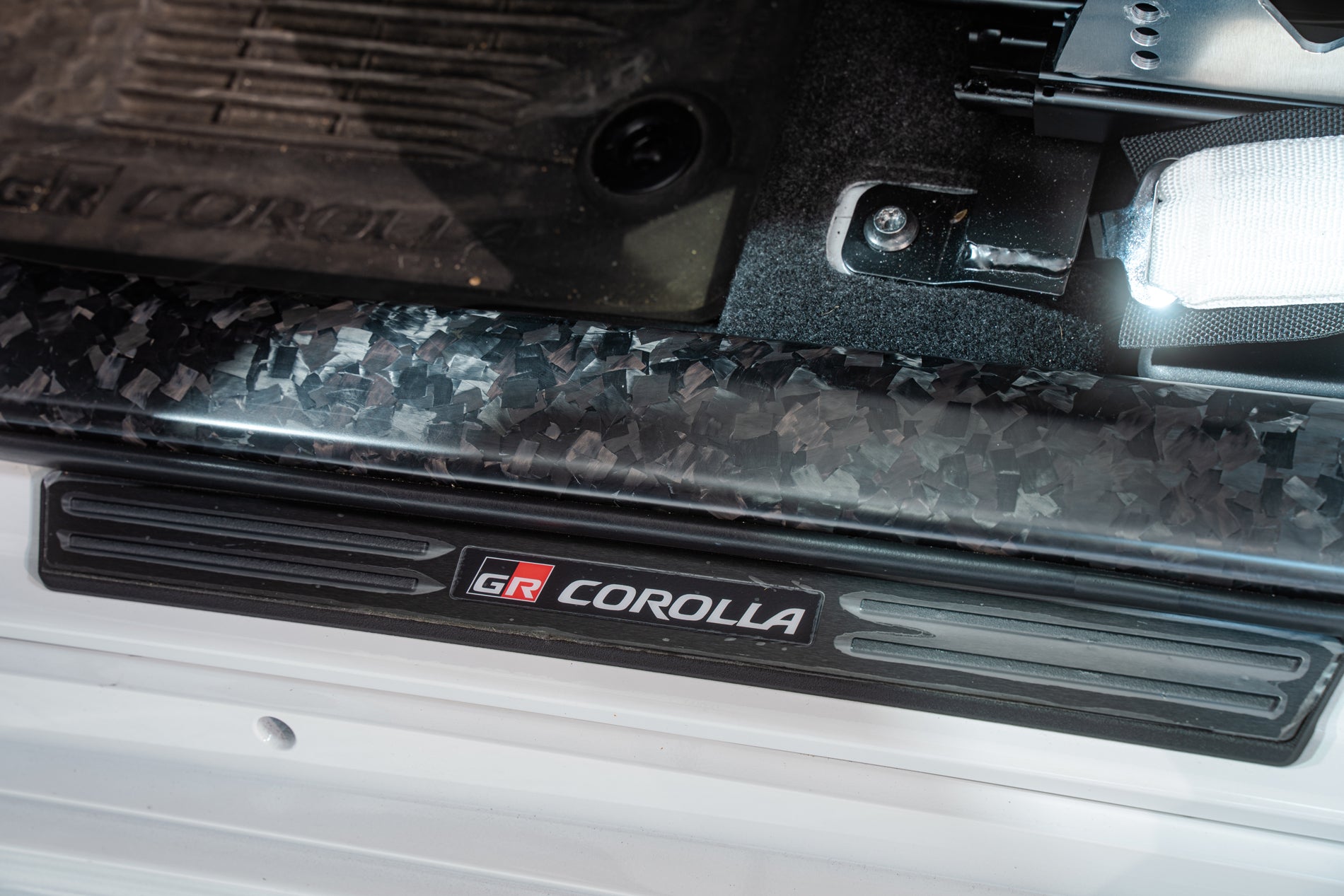 TOM'S Racing - Forged Carbon Front Scuff Plate Cover - Toyota GR